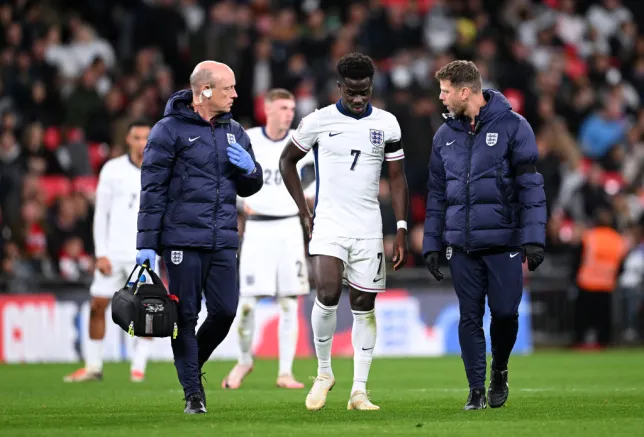 Bukayo Saka sustains injury as Arsenal star hobbles off the field in England defeat