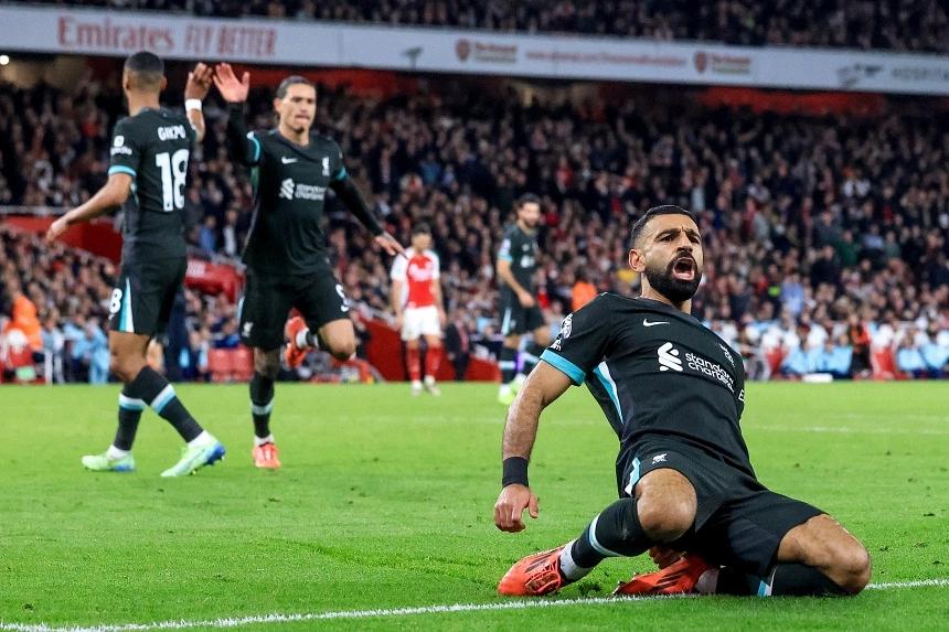 Salah rescues Liverpool with late equalizer against Arsenal in title race